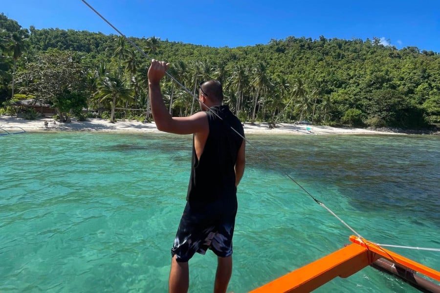 Traveller on a boat in the Philippines